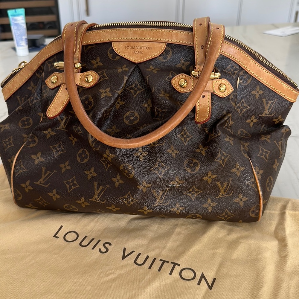 Louis Vuitton Tivoli GM. Used. Includes original dust bag. Normal wear.